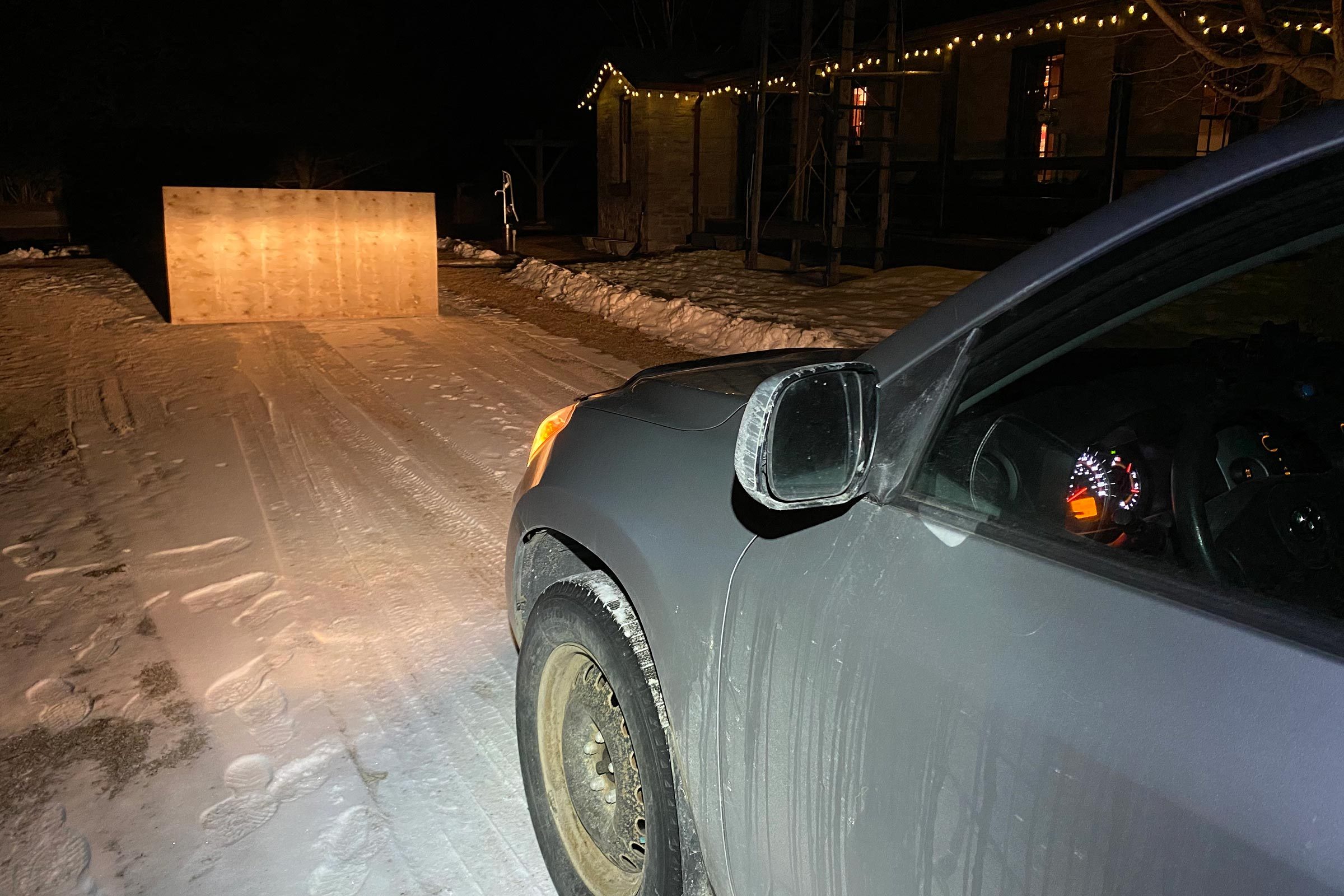 vehicle headlights shining on board