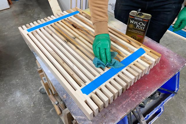 applying stain to the table