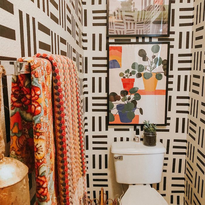 geometric black and white wallpaper in bathroom