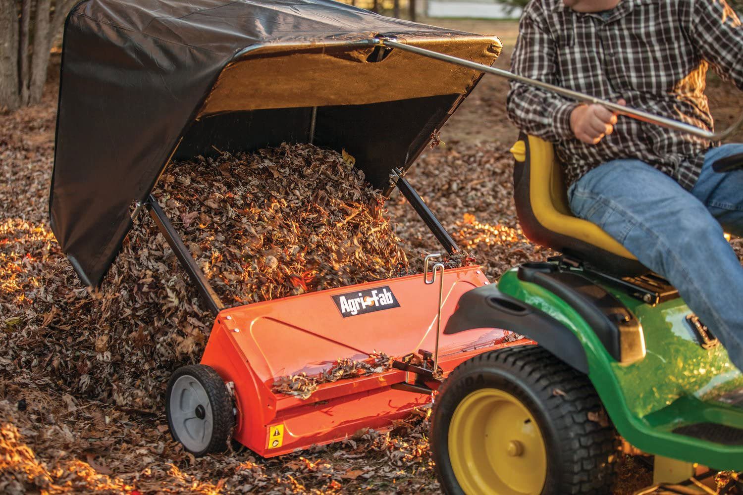 Meet the Agri Fab Grass Sweeper—It’ll Save Your Yard and Your Time