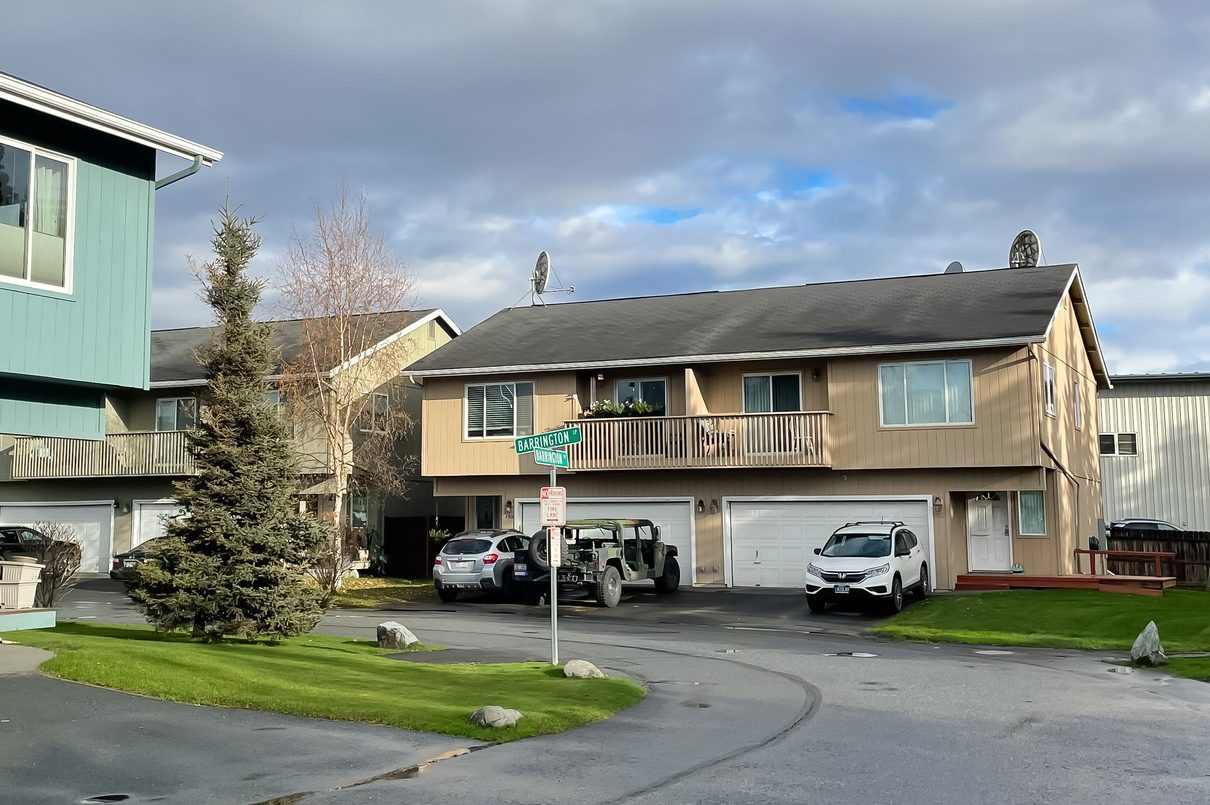 Typical two story duplex houses has two units in same building, share a common wall in Anchorage, Alaska