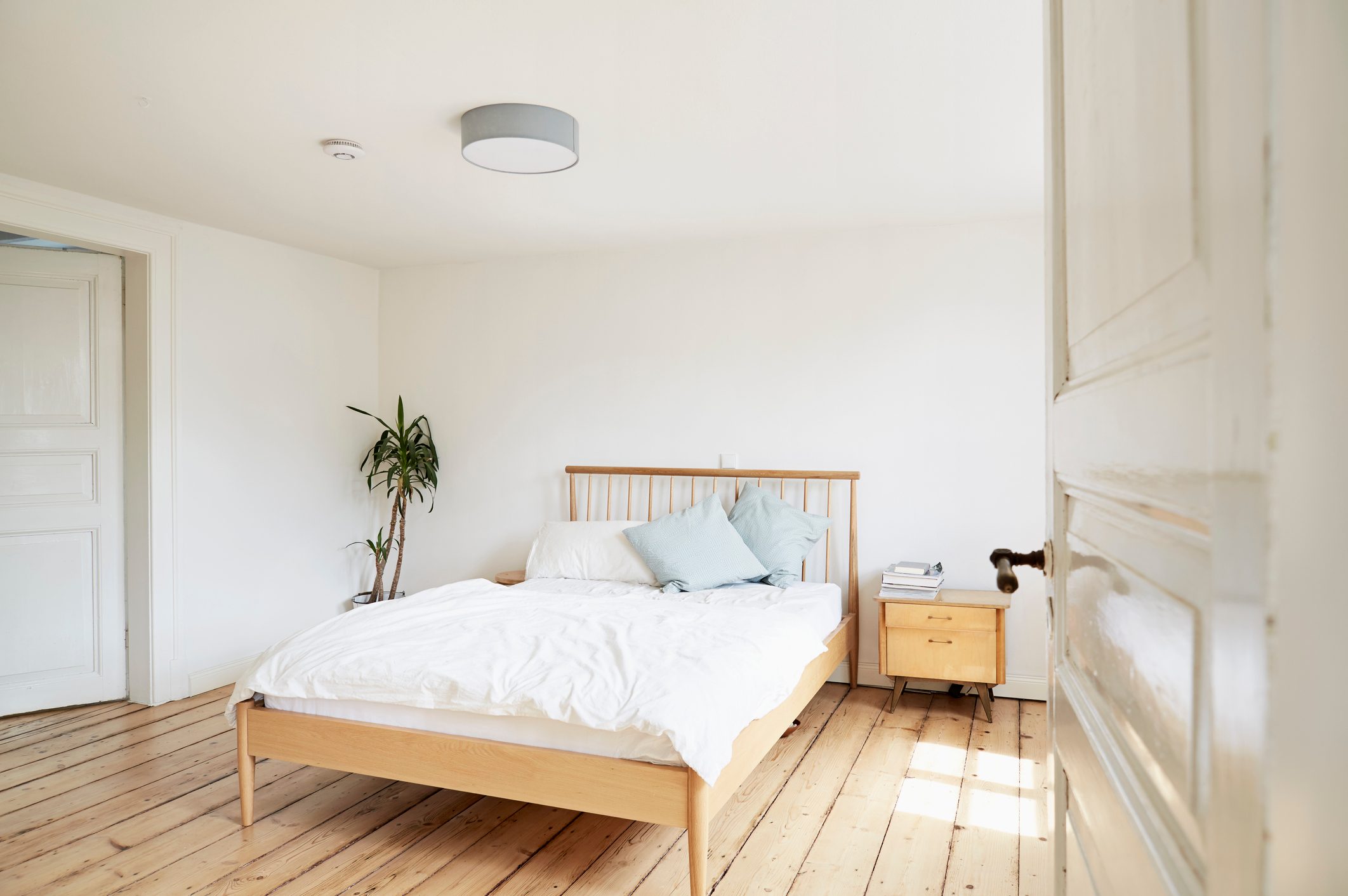 Bright modern bedroom in an old country house