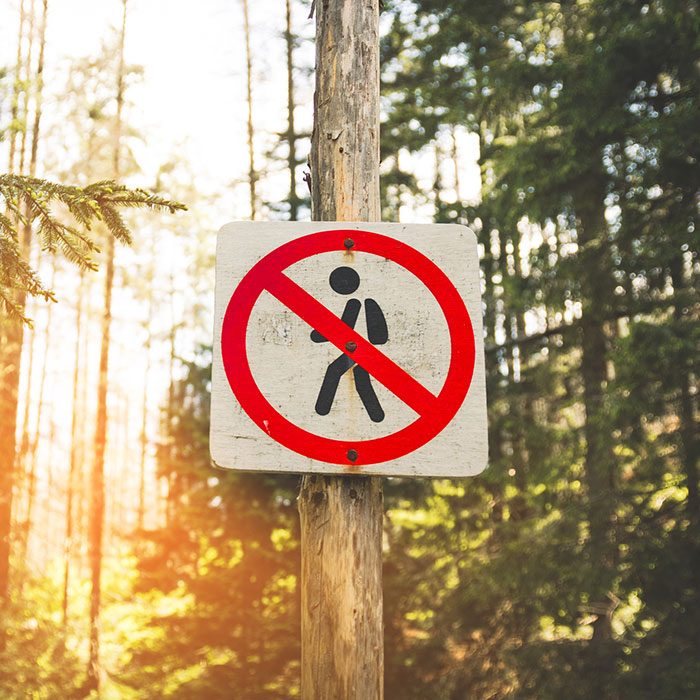 Round Road Sign Prohibiting The Movement Of Pedestrians