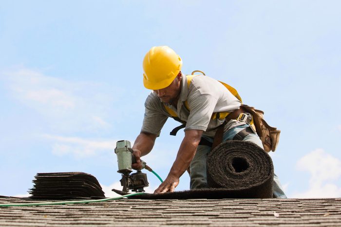 man doing Roof Construction