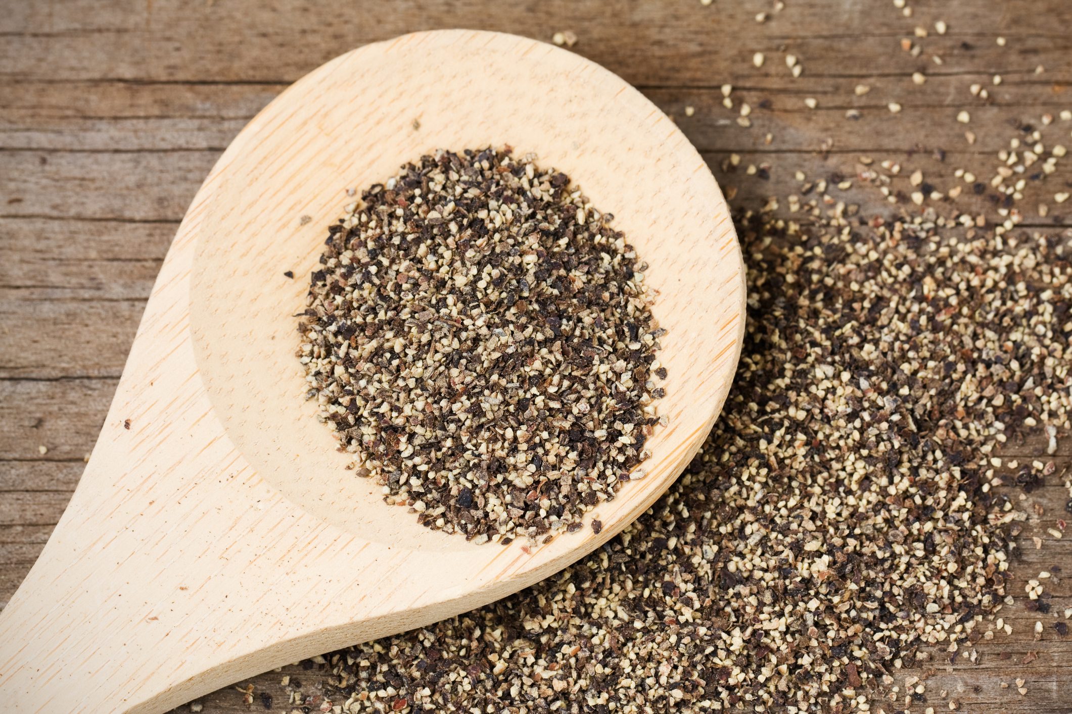 Black Pepper on Wooden Spoon