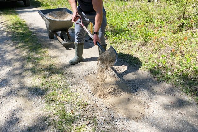 adding a second layer of filling wit ha shovel