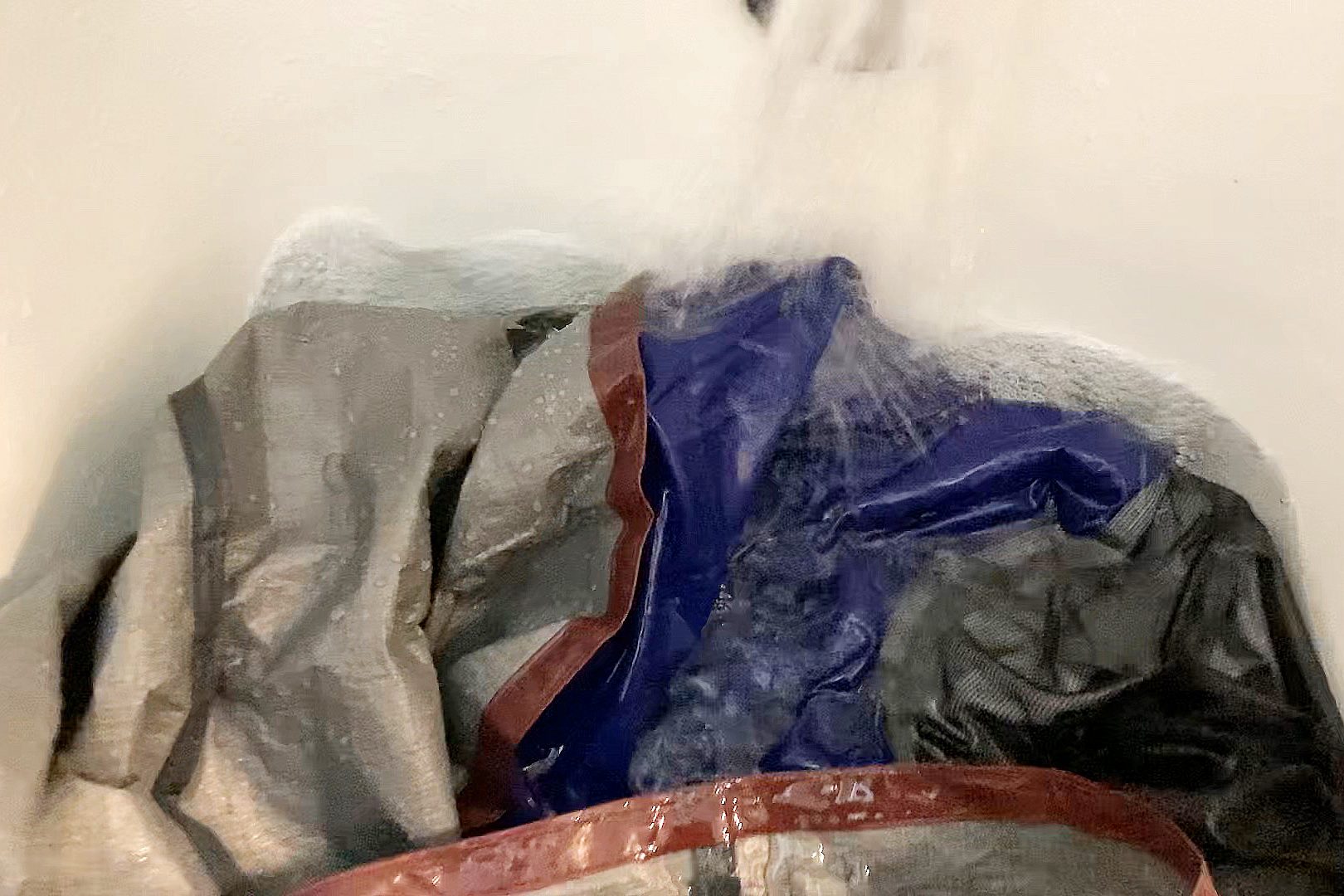 rinsing tent in a tub