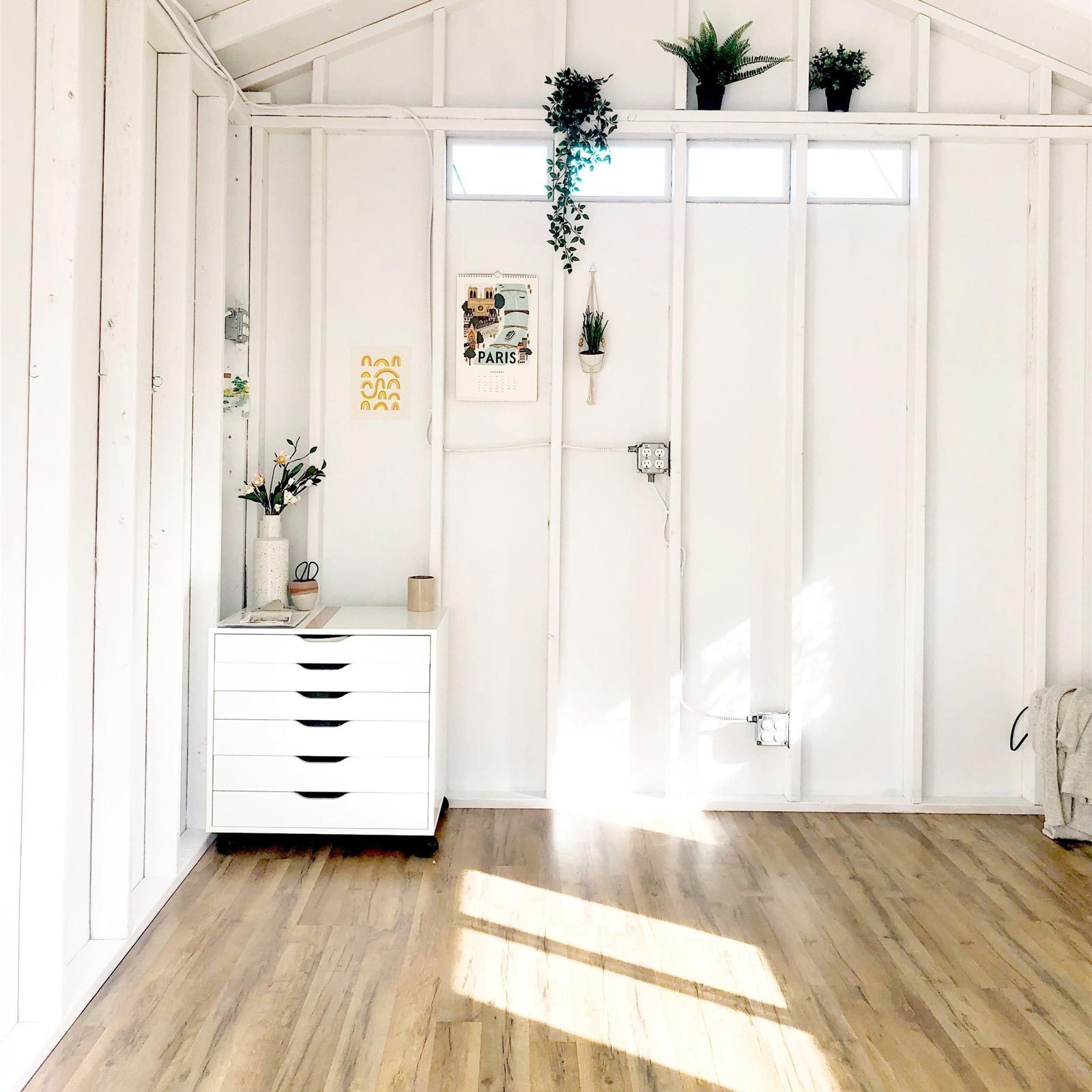 minimalist white she shed interior