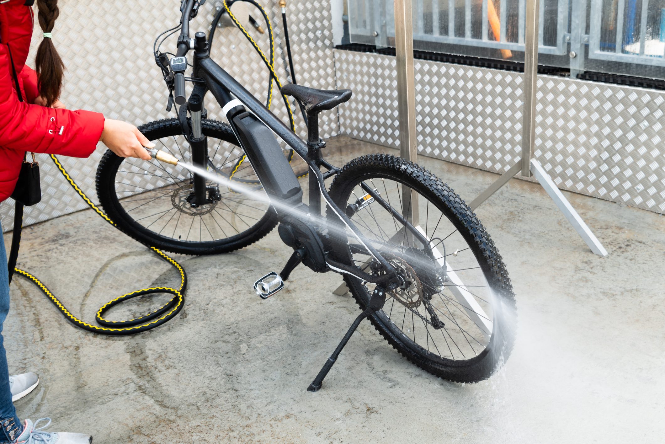 Woman Washing Mountain Bike