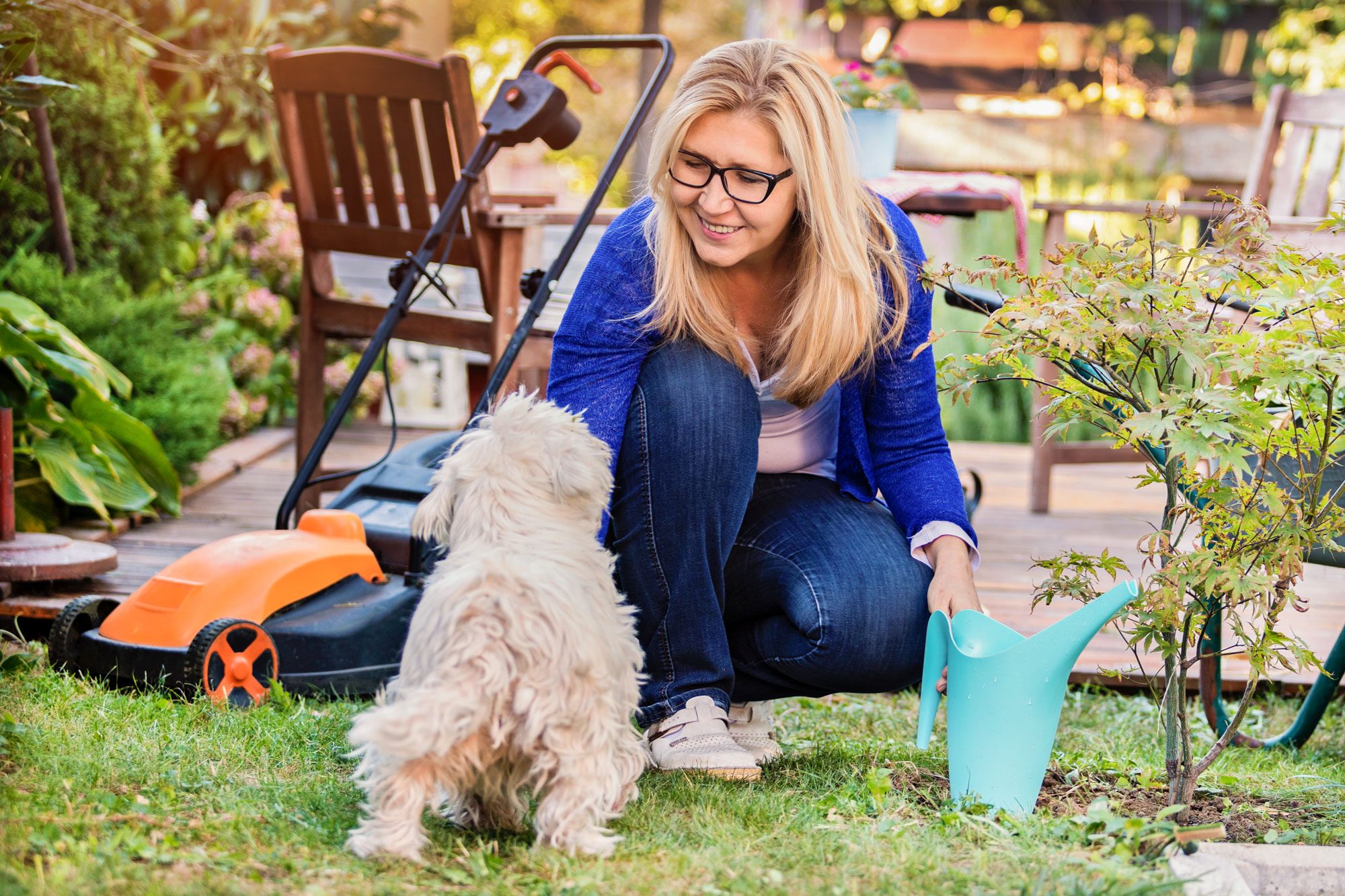 Playing With Dog While Gardening