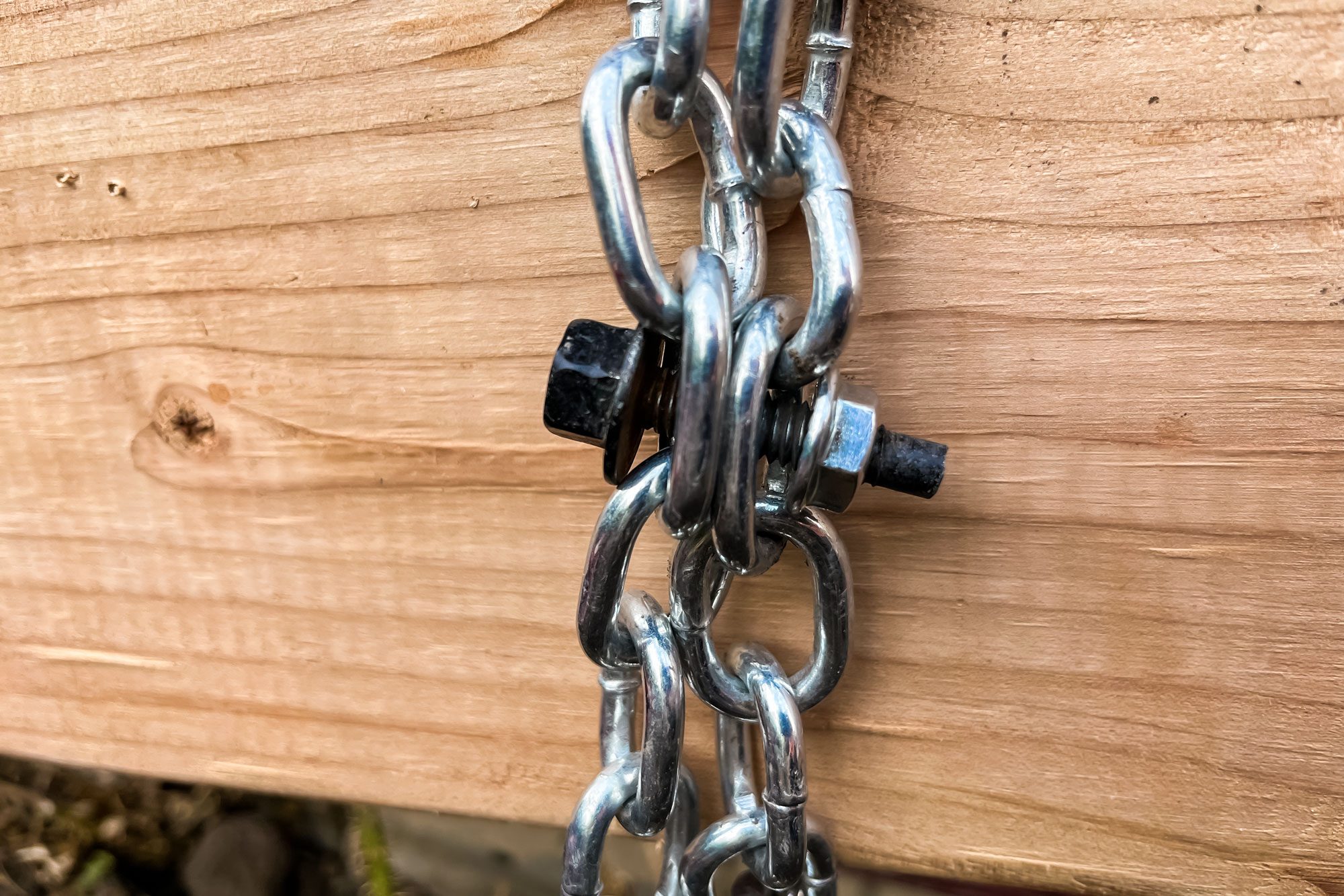 Close Up Of Bolt And Chain