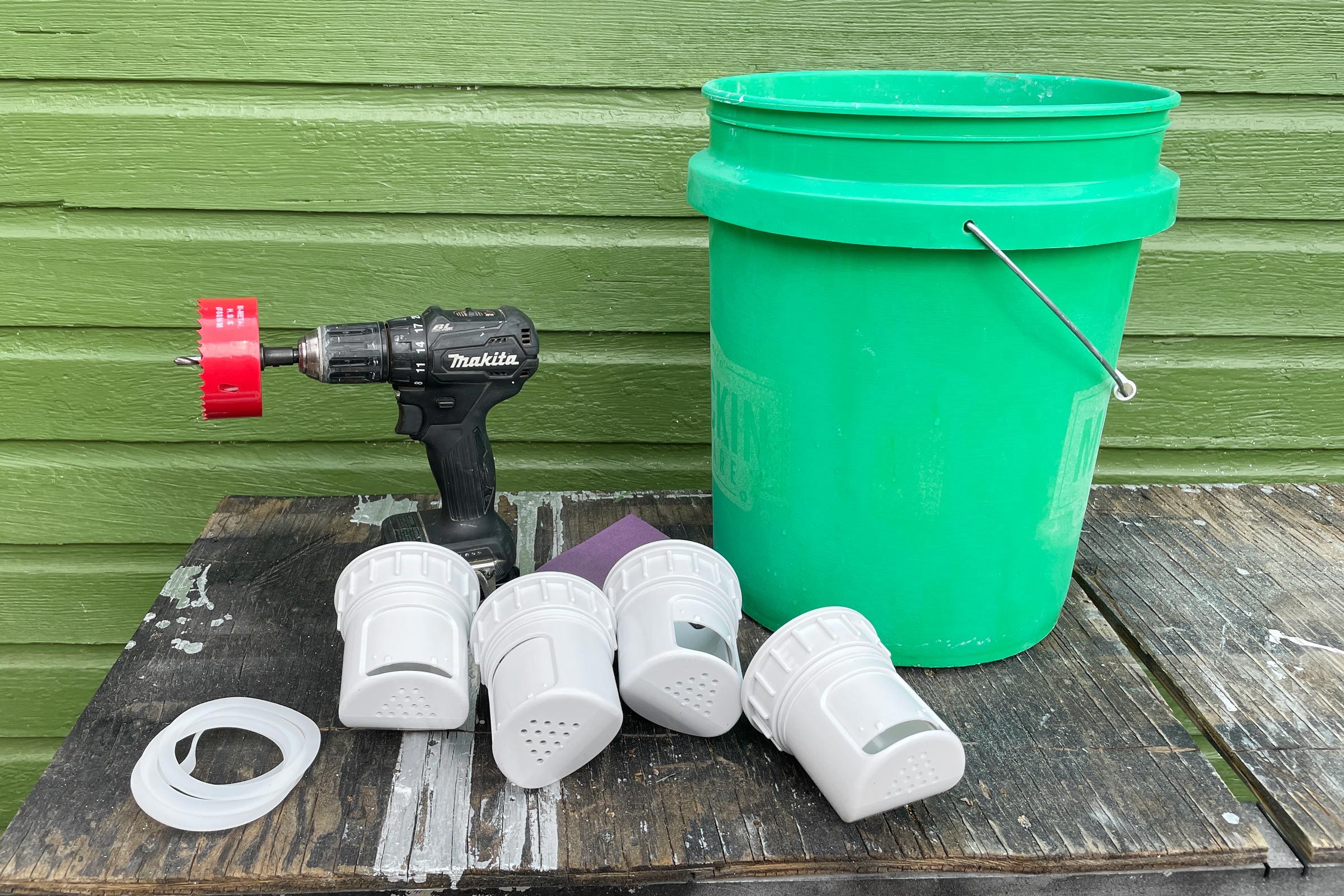 materials for a DIY no waste chicken feeder