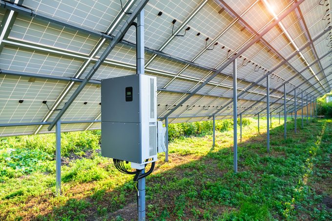 Solar panel inverter under Solar Panel canopy in the backyard made for solar power plant