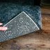 7 Ways To Flatten a Rug