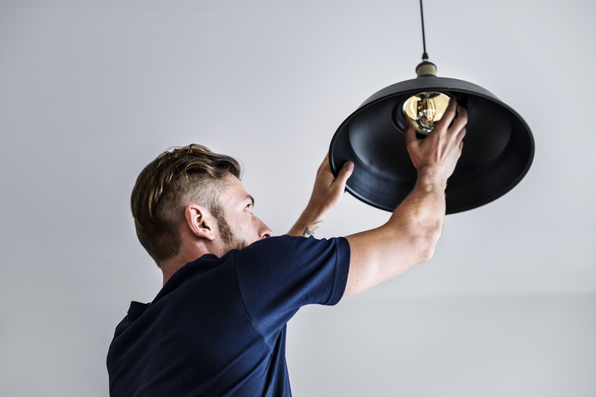 Man changing lightbulb