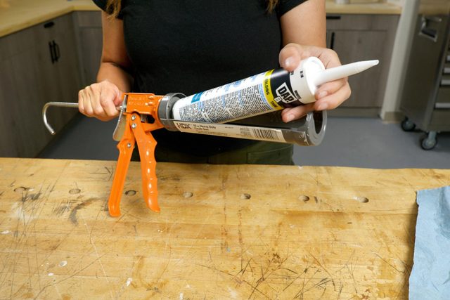 Open the caulking tube