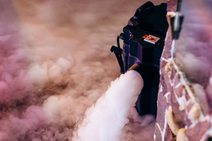 Dry Ice Low Fog Machine used to create a spooky atmosphere in a restaurant wedding or halloween decoration