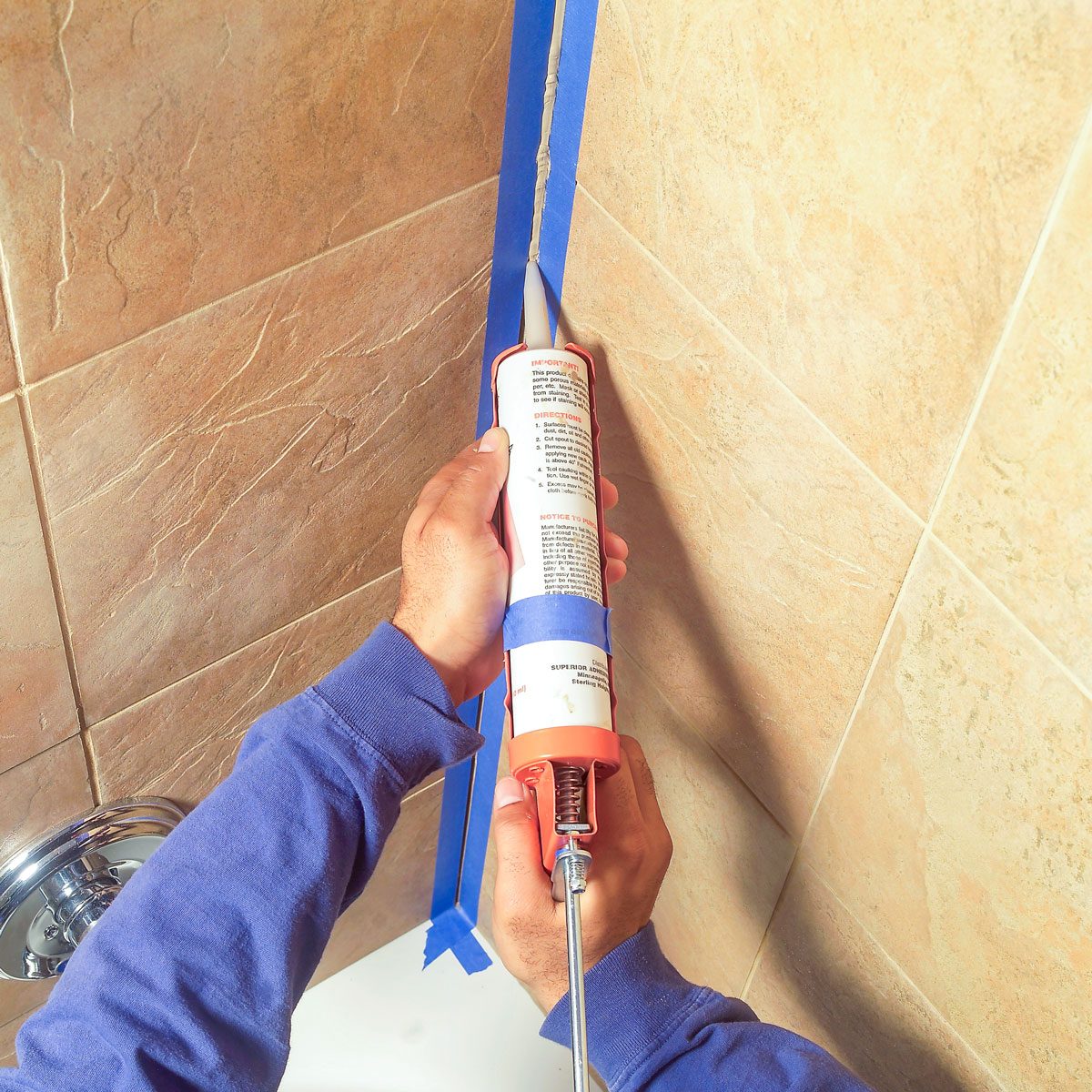 Caulking Wall Tiles with Caulk Gun