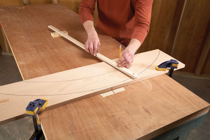 Drawing Large Curves with a Giant Compass