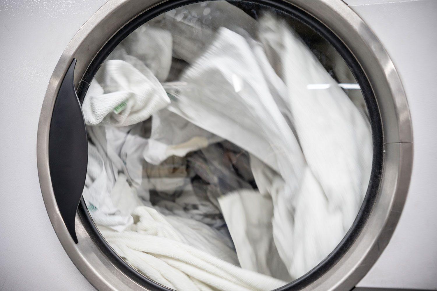 Close Up Of Industrial Washing Machine At A Laundromat