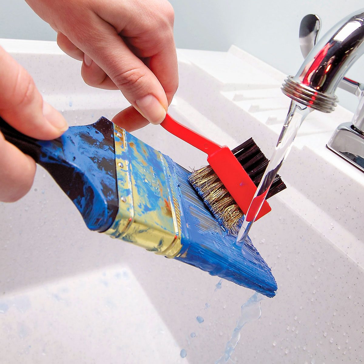 Cleaning Paint Brush with a Golf Club Brush