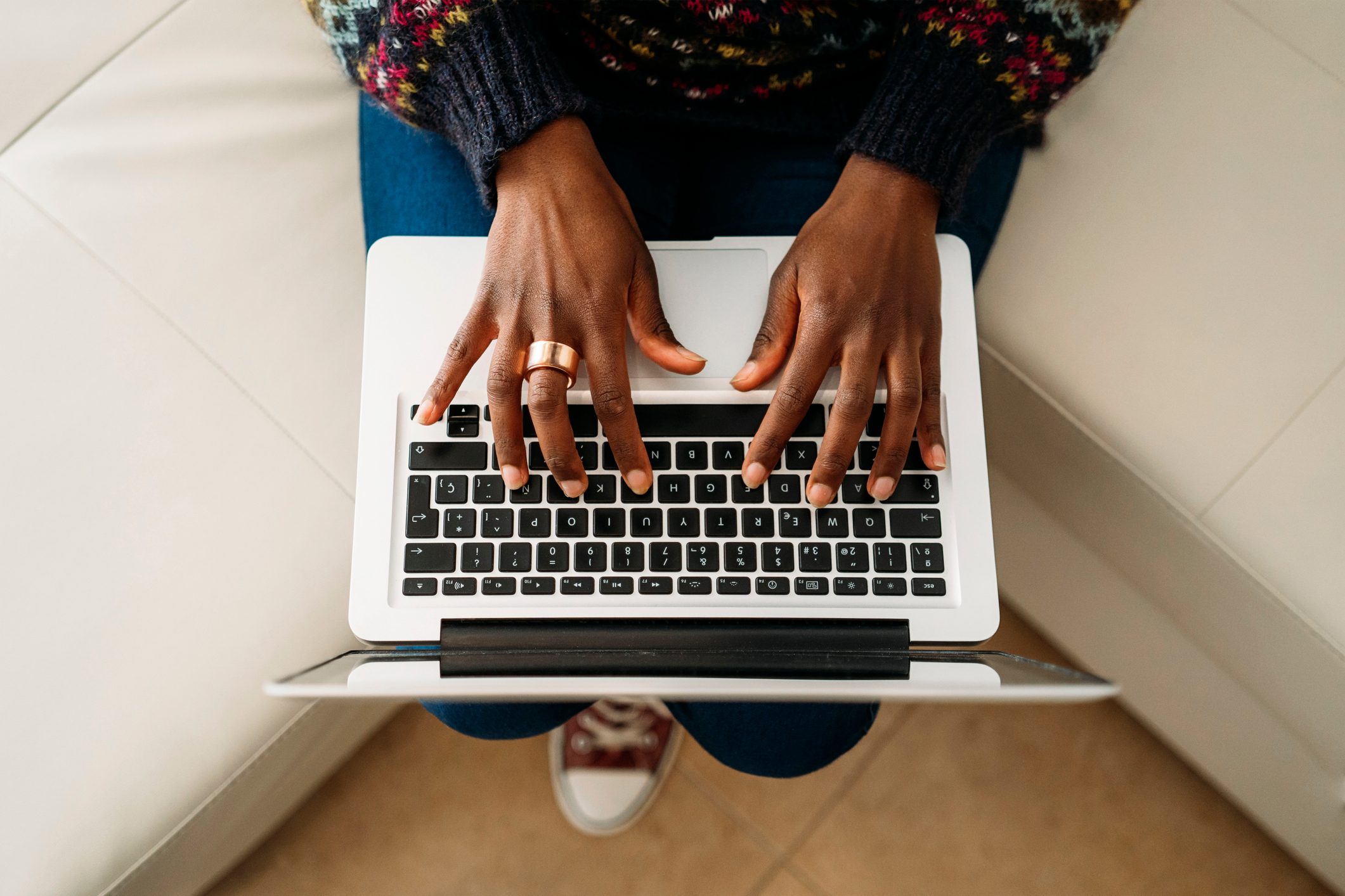 Businesswoman seeing reviews on laptop