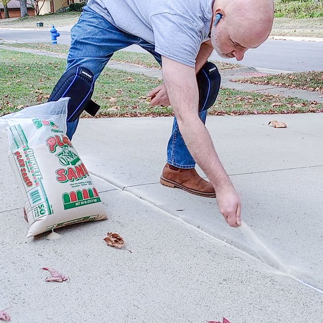 Texturing the caulk with sand