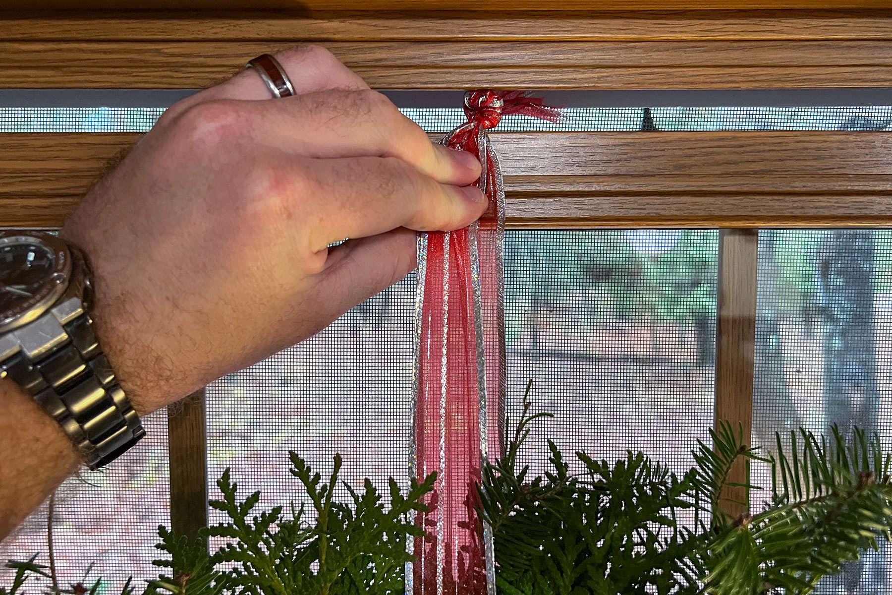 Tying the ribbon on window