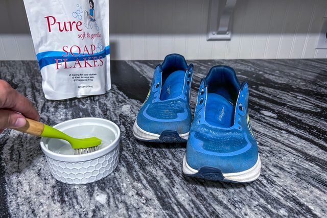 Dip brush in liquid detergent to wash