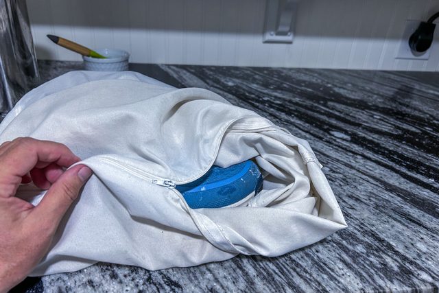 Put Shoes in Zippable pillowcase for machine wash