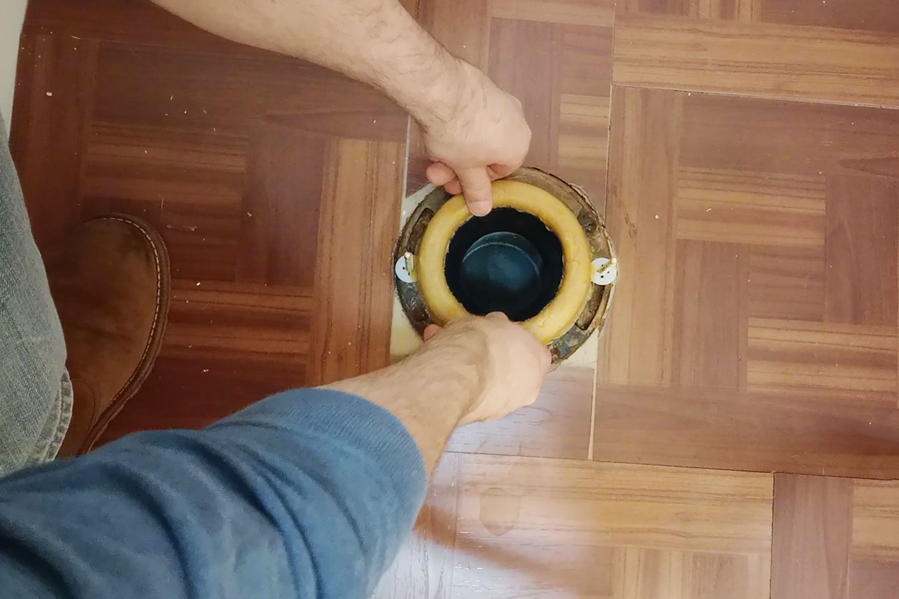 How install a wax ring on a toilet