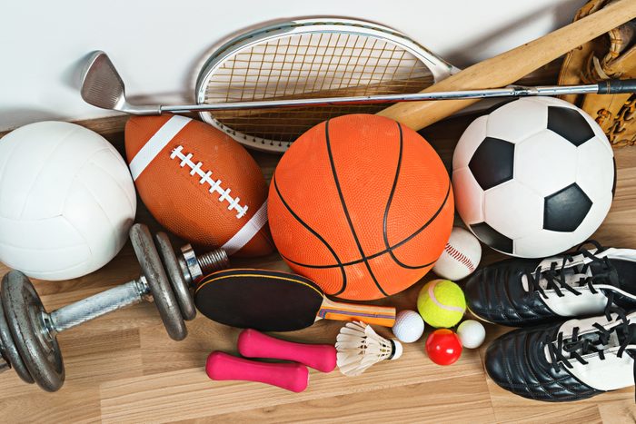 Sports Equipment on wooden background