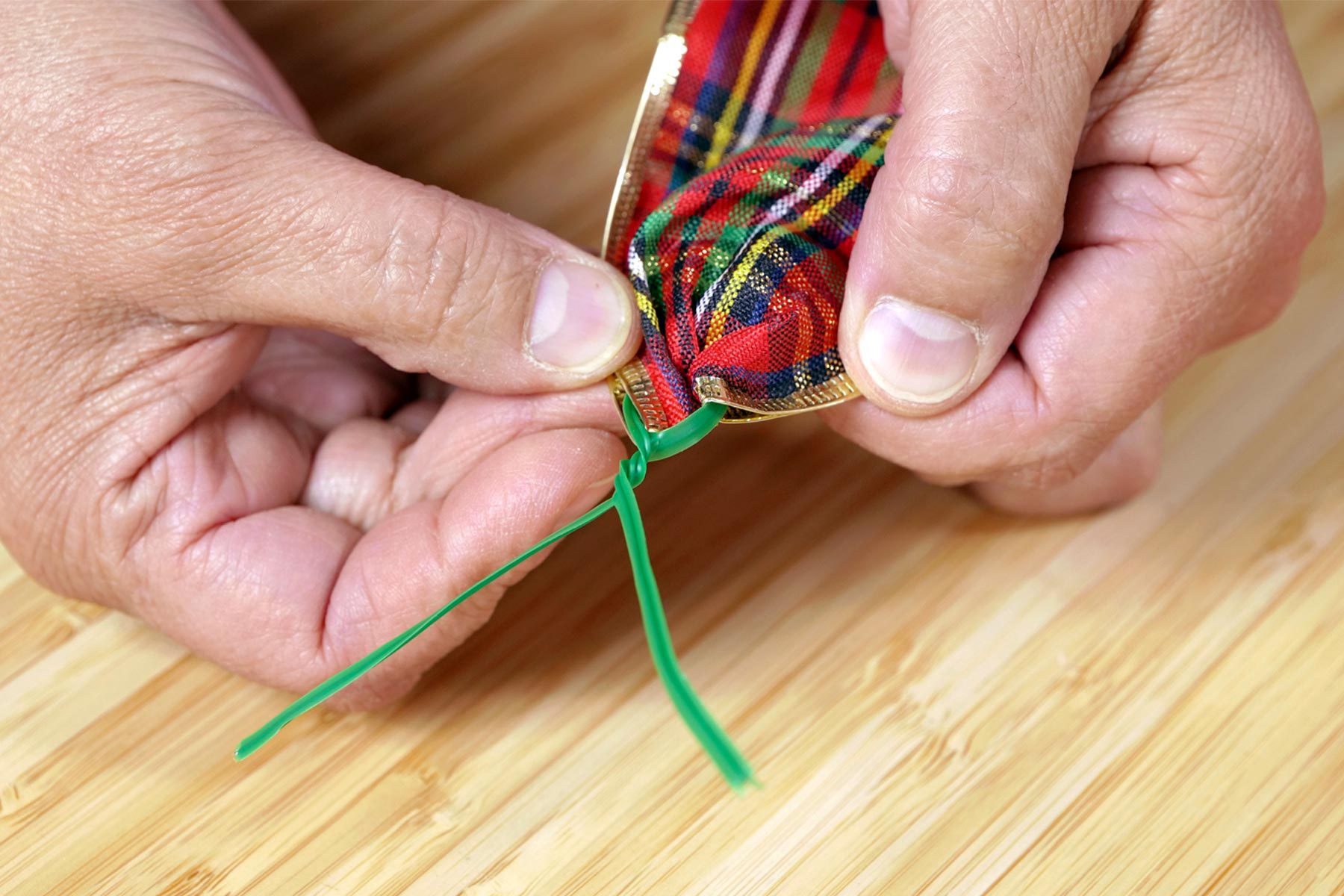 How To Put Ribbon On A Christmas Tree Attach floral wire to ribbon