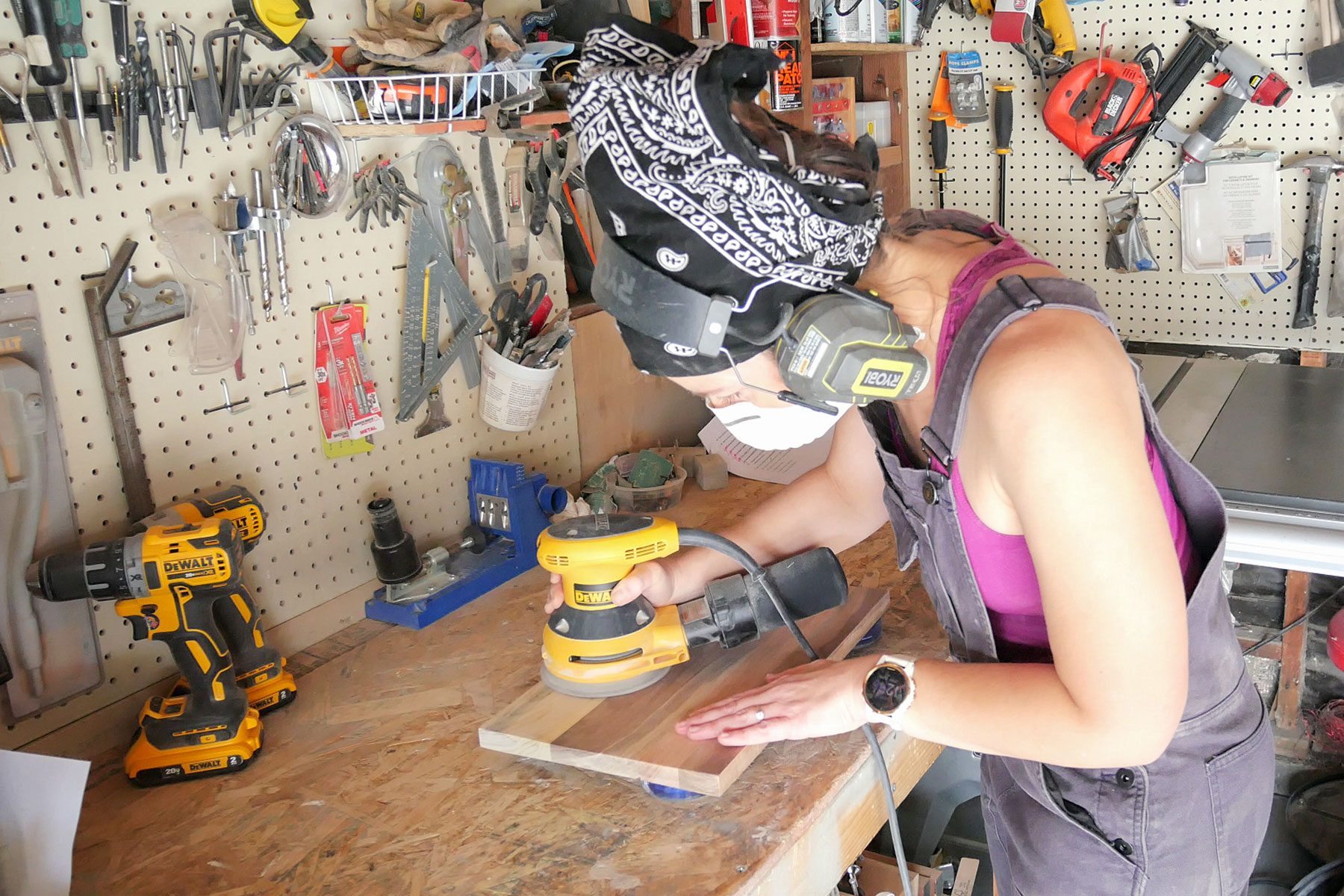 Sanding the wooden board