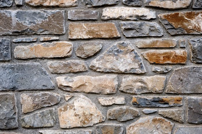 Irregular natural stone wall