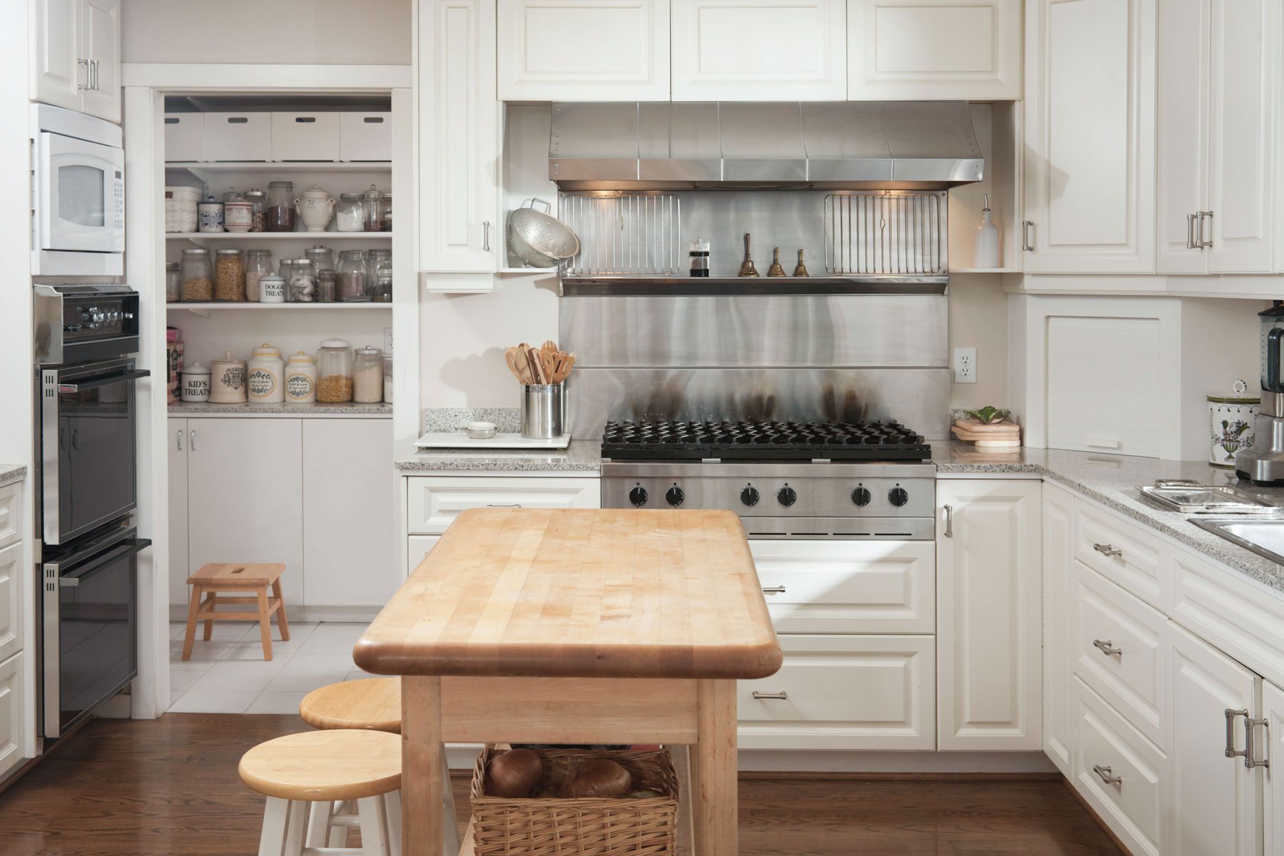 Wooden counter and stove in modern kitchen 