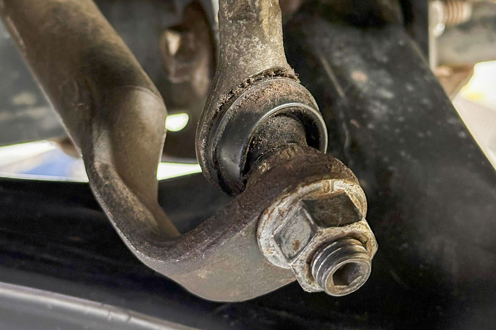 a badly worn ball socket sway bar link