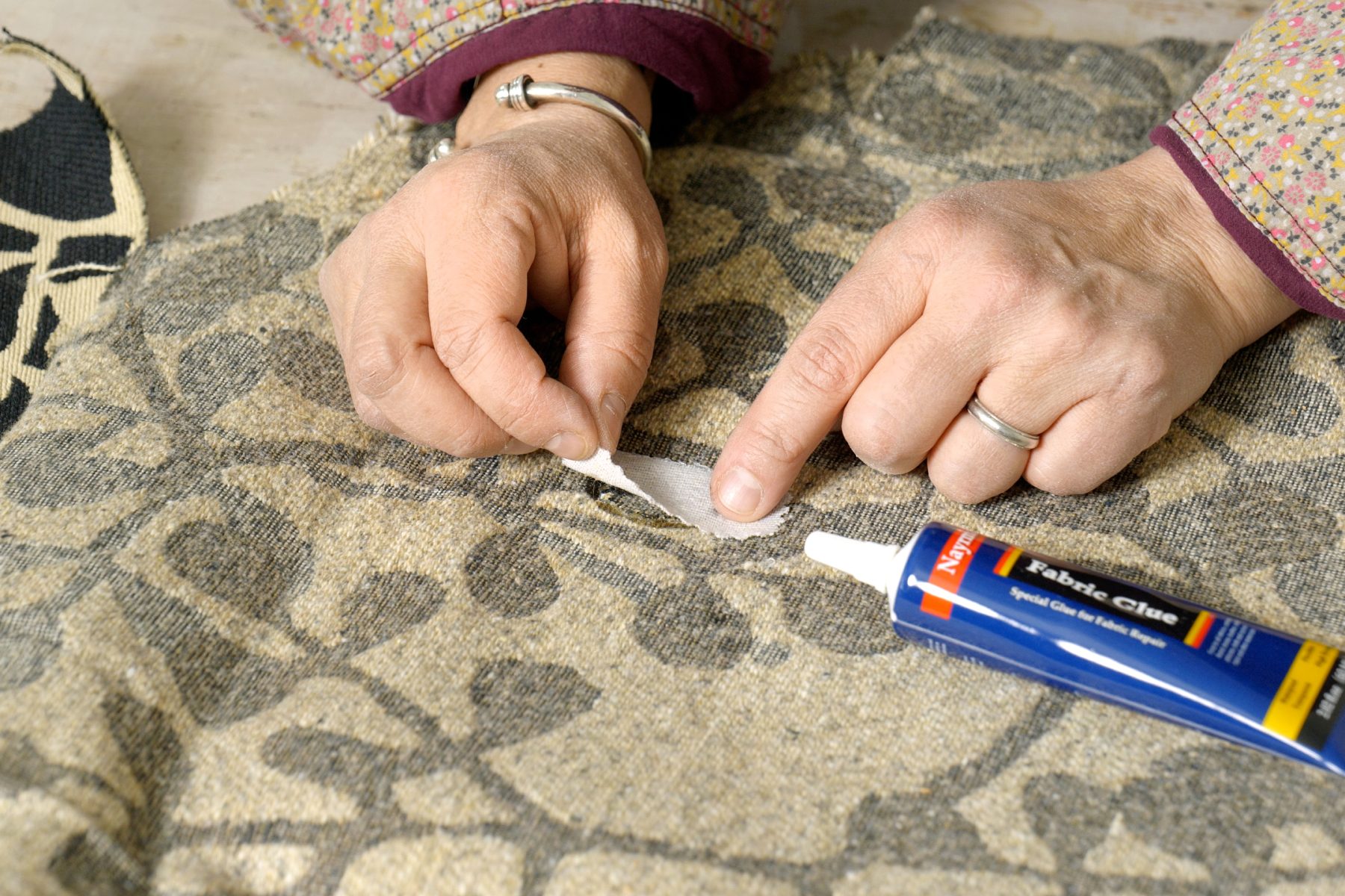 Upholstery Repair How To Fix A Hole Glue backing into place