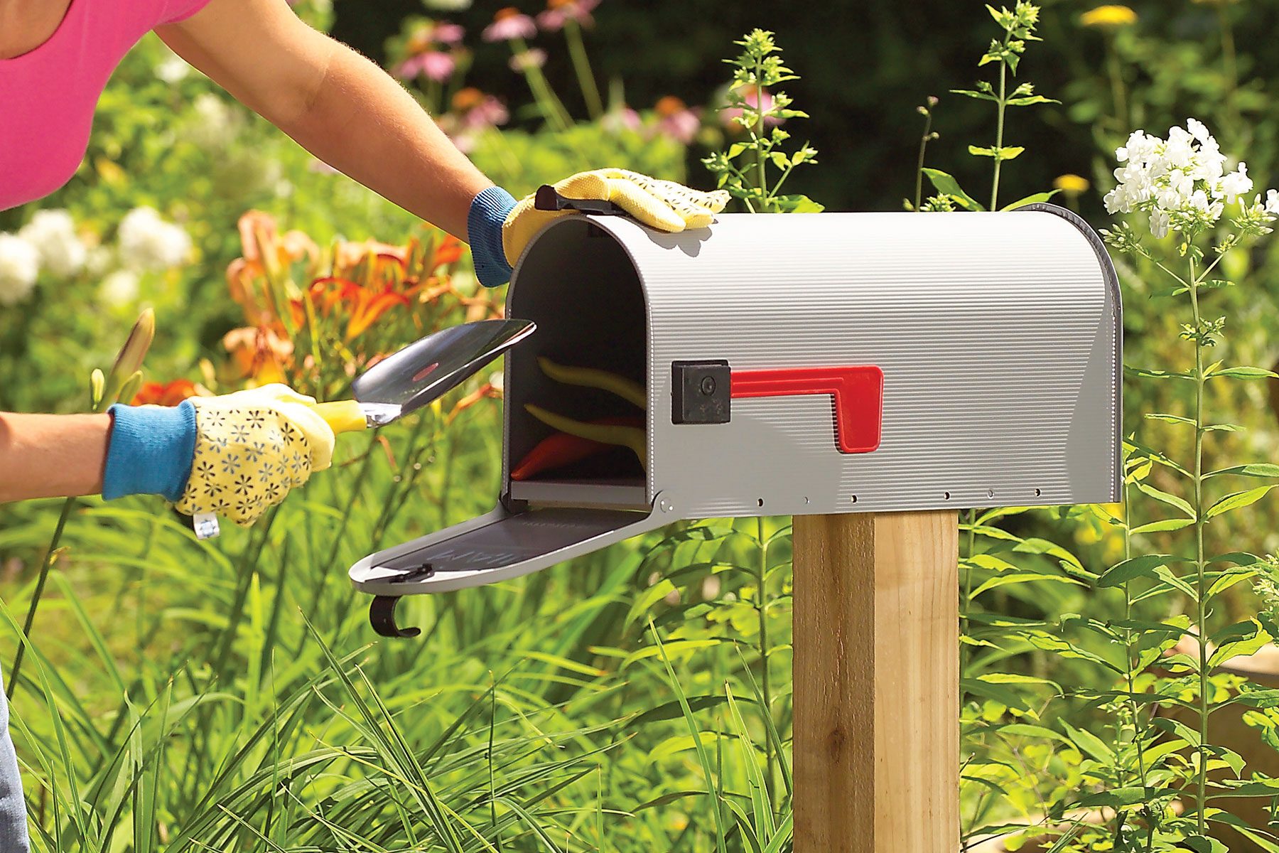 Women opening letterbox