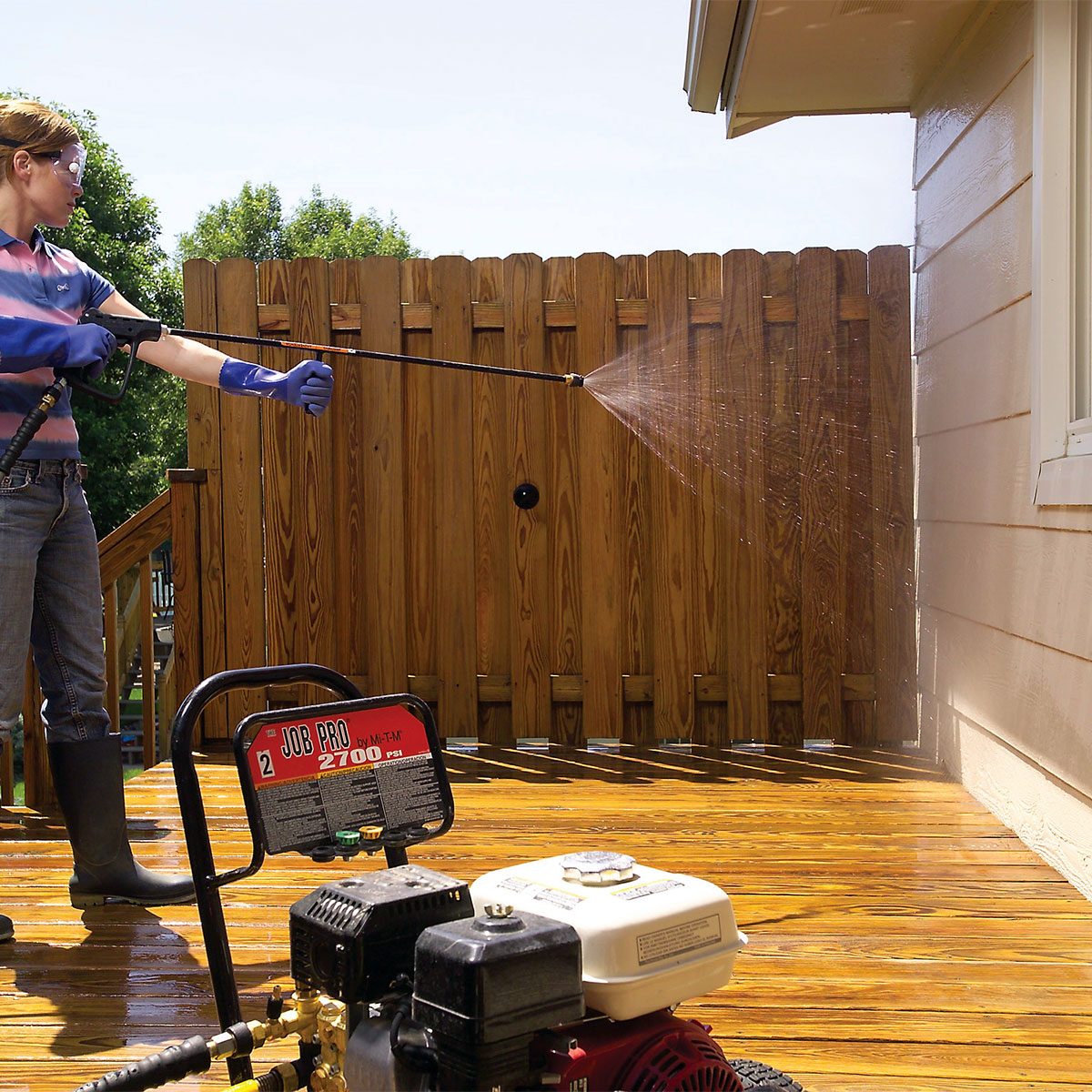 Spraying the wall with chemicals