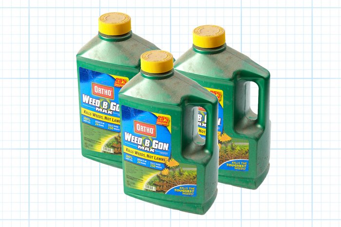 concentrated fertilizer bottles on grid background