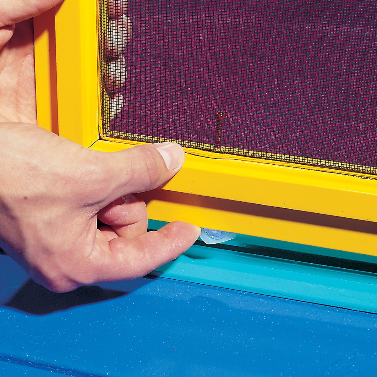 Lifting the wheel out of screen door track