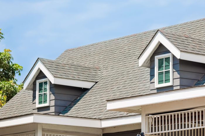 Roof Shingles With Garret House On Top Of The House