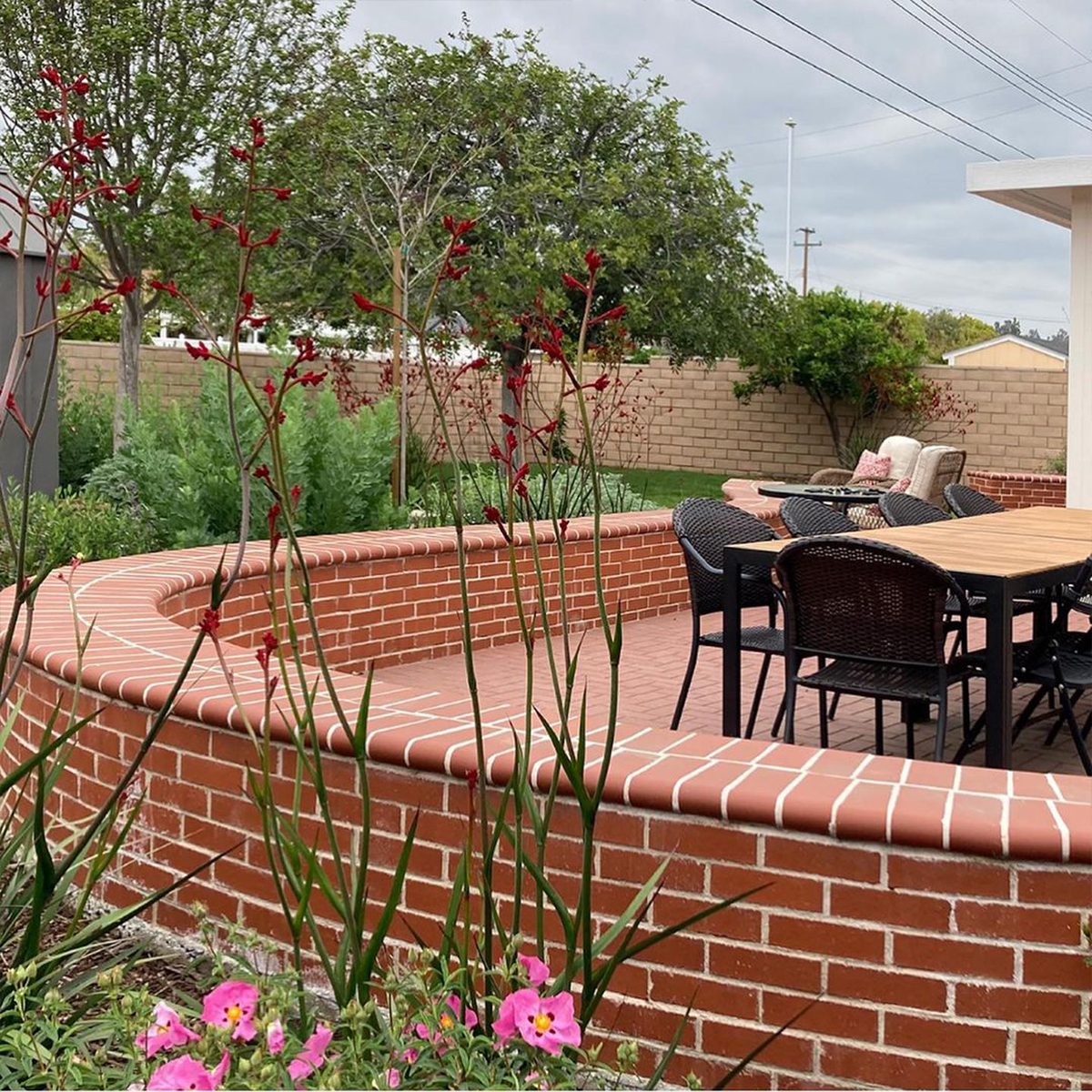 8 Best Brick Patio Ideas Walled Brick Patio Courtesy Tilly Design Instagram