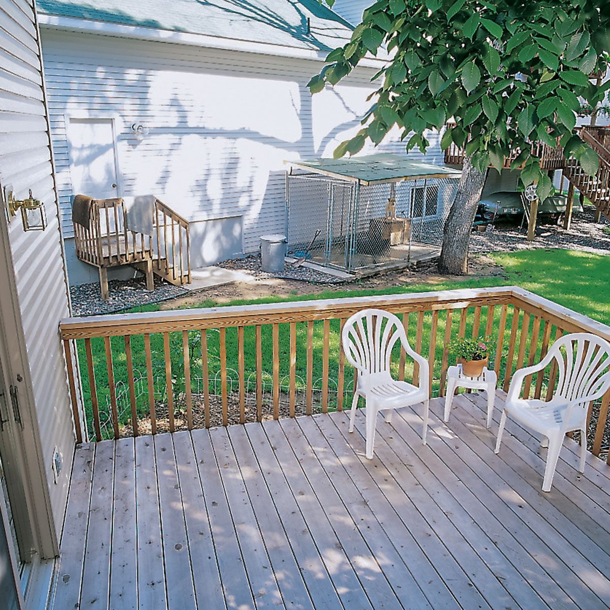 Deck And Railing Before The Fence