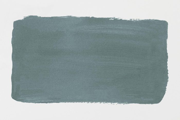 The 2025 Colors Of The Year And How To Use Them Mapped Blue paint swatch on plain wall