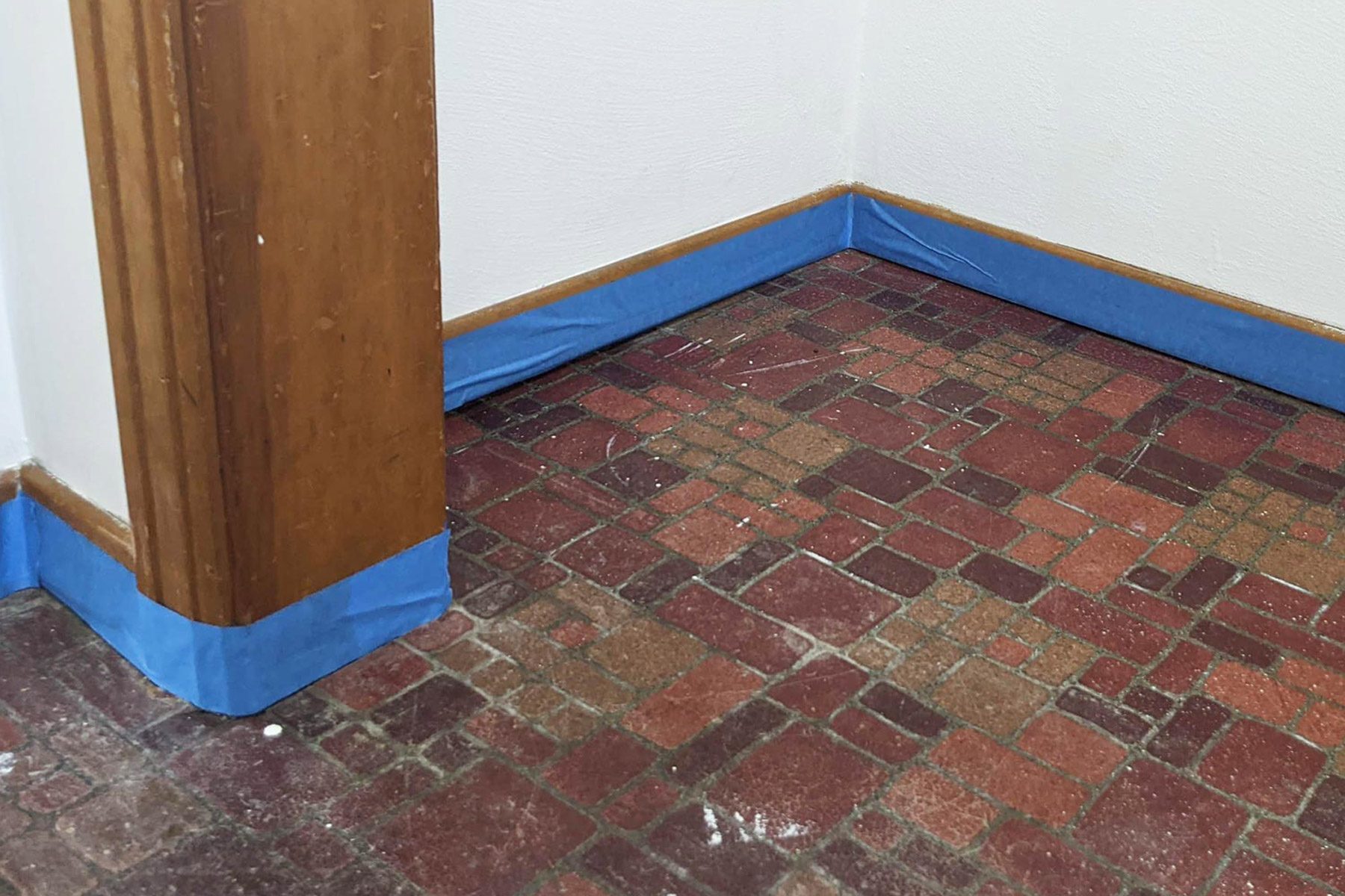 Painter's tape applied to trim.