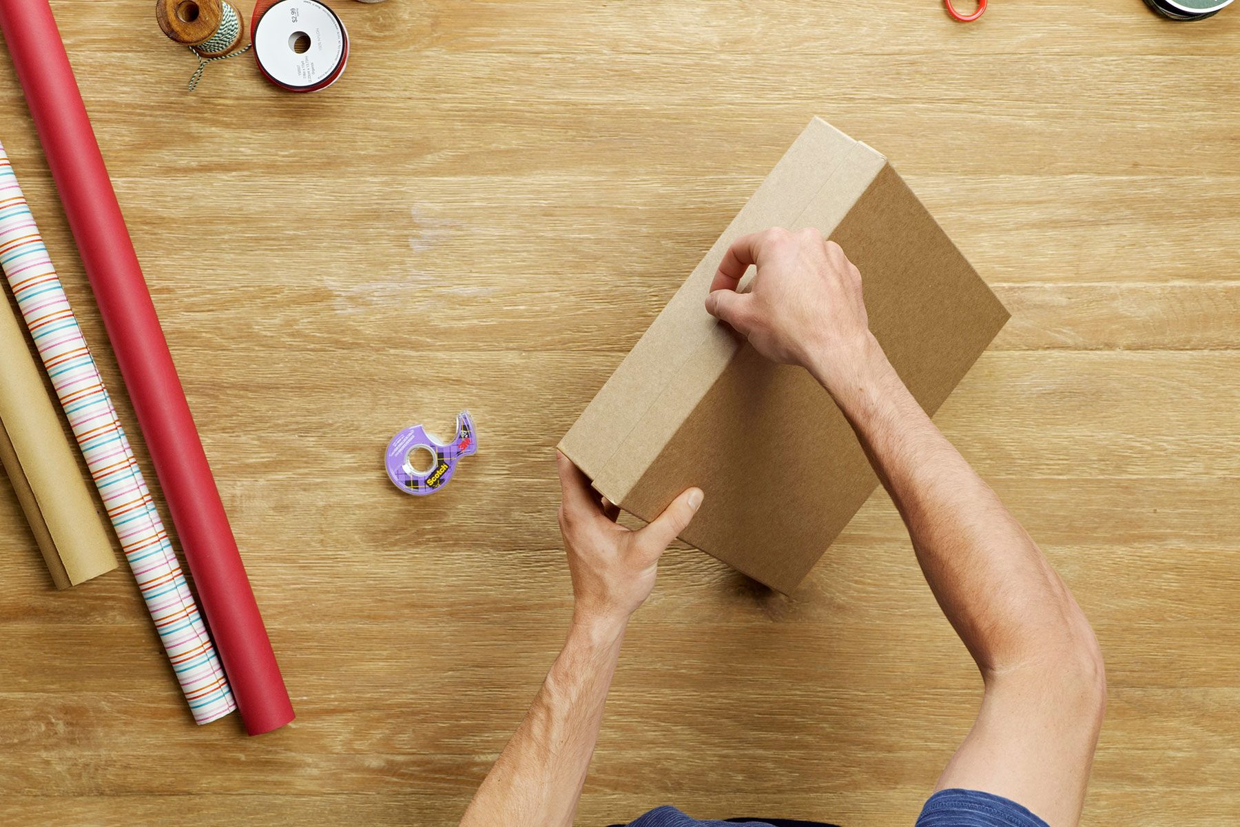 How To Wrap A Present Fhmvs24 Pk 09 13 Wrappingaboxpresent Step1