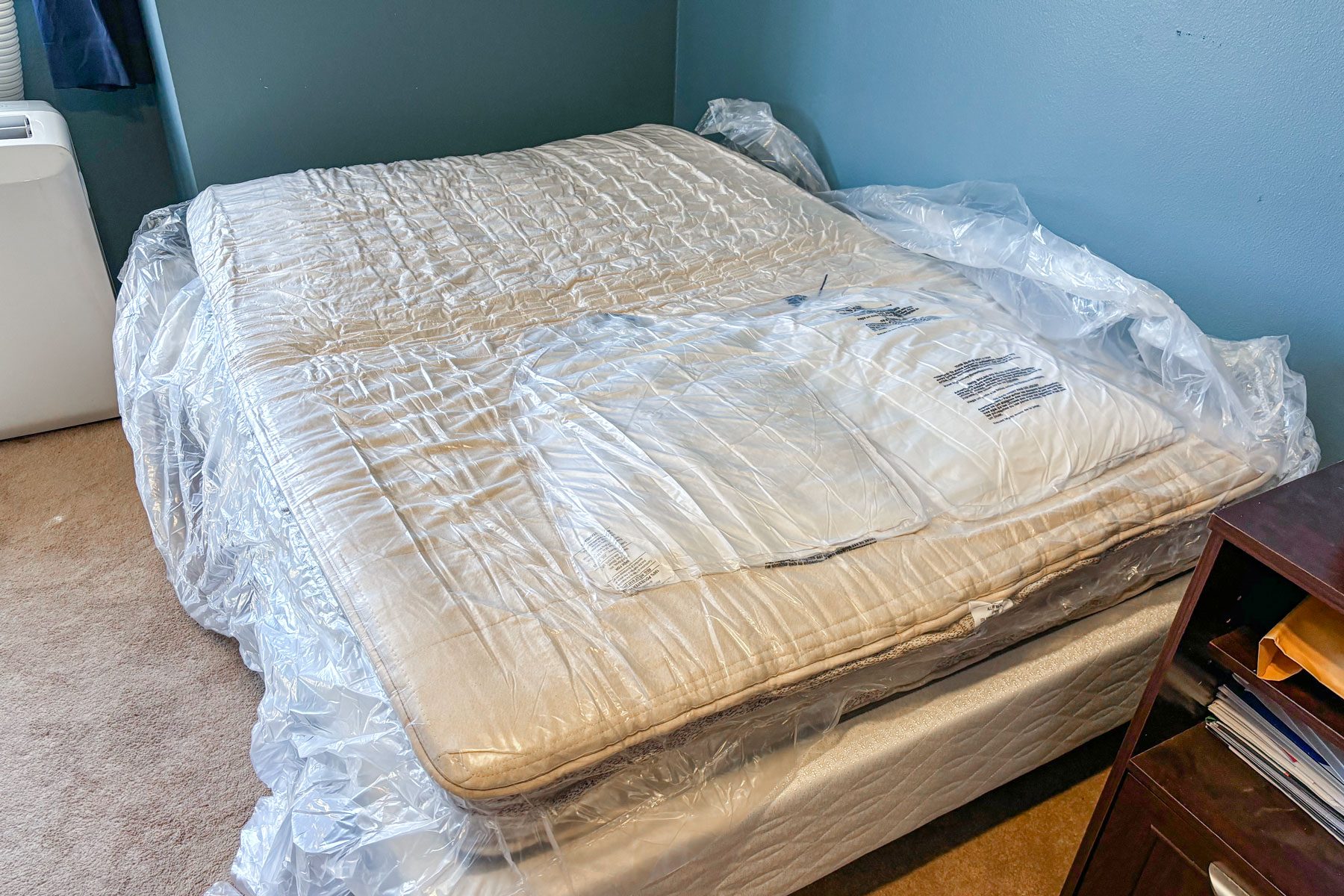 Birch Natural Mattress in packaging with two pillows