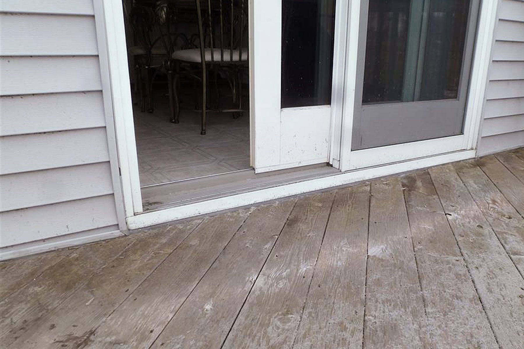 Silent Signs That Your House Has A Serious Problem Decking Directly Under a Door